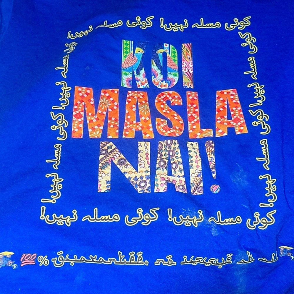 One of a kind pakistani motif t shirt that reads " no problem at all" in the nat